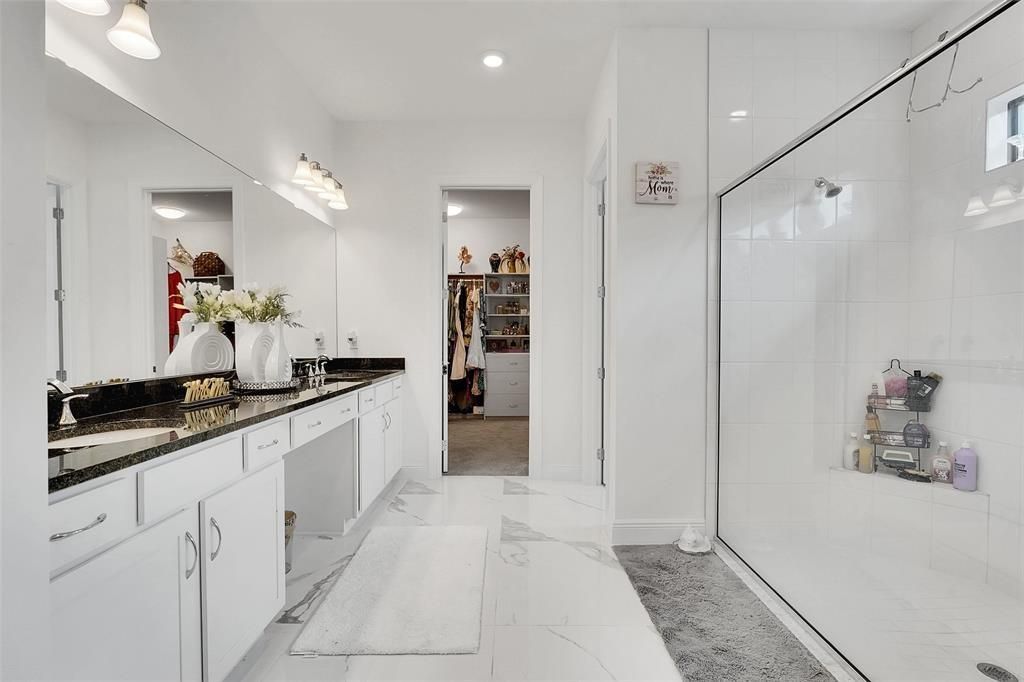 Bathroom, Dual Sink Vanities, Glass Shower, Interior, Marble, Recessed Lighting