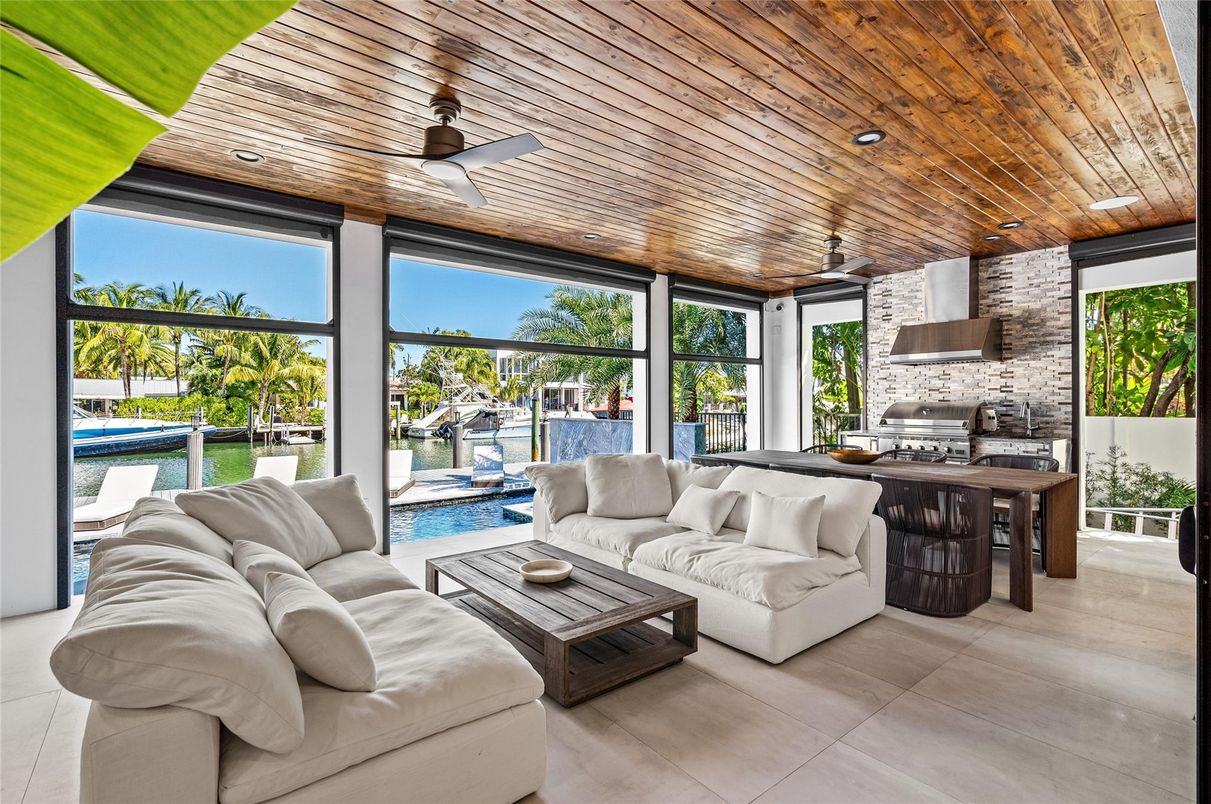 Interior, Kitchen, Living room, Recessed Lighting, Stainless Steel Appliances, Stone Walls, Water, Wooden Ceilings