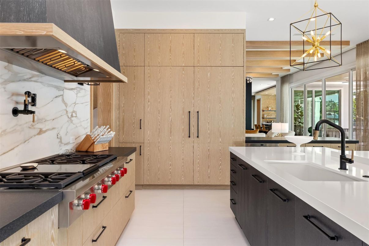 Interior, Kitchen, Marble Walls, Pendant Lights, Recessed Lighting, Stainless Steel Appliances