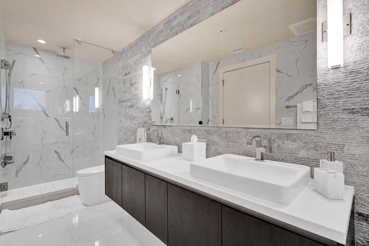 Bathroom, Dual Sink Vanities, Glass Shower, Interior, Marble Walls, Recessed Lighting