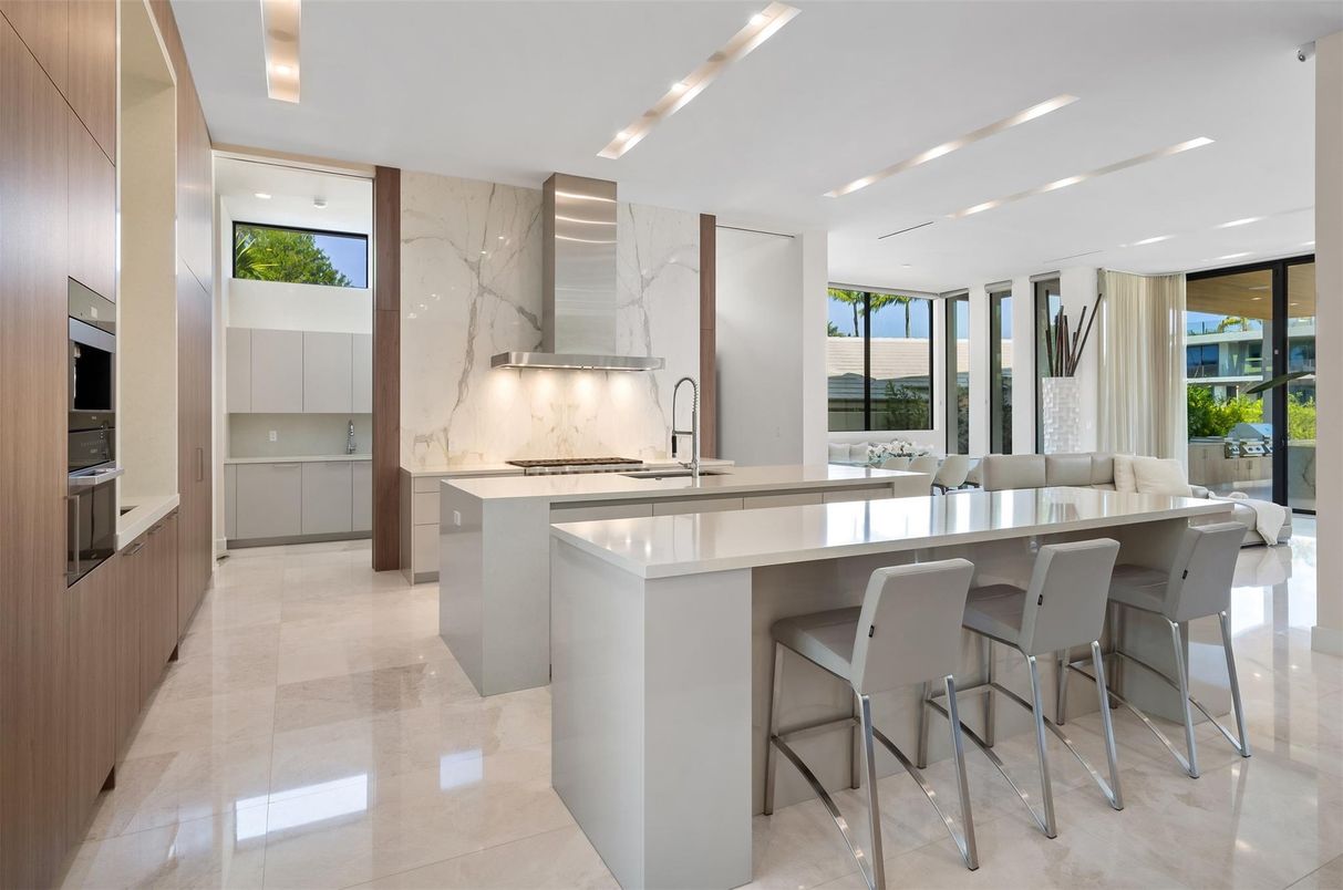 Interior, Kitchen, Marble Walls, Recessed Lighting, Stainless Steel Appliances