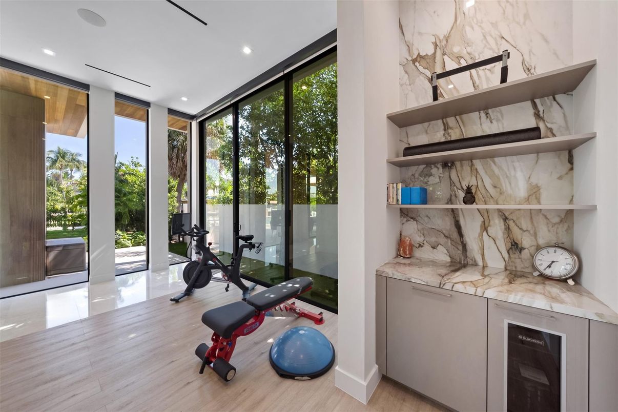 Fitness Equipment, Interior, Marble Walls, Recessed Lighting, Wood Texture Flooring