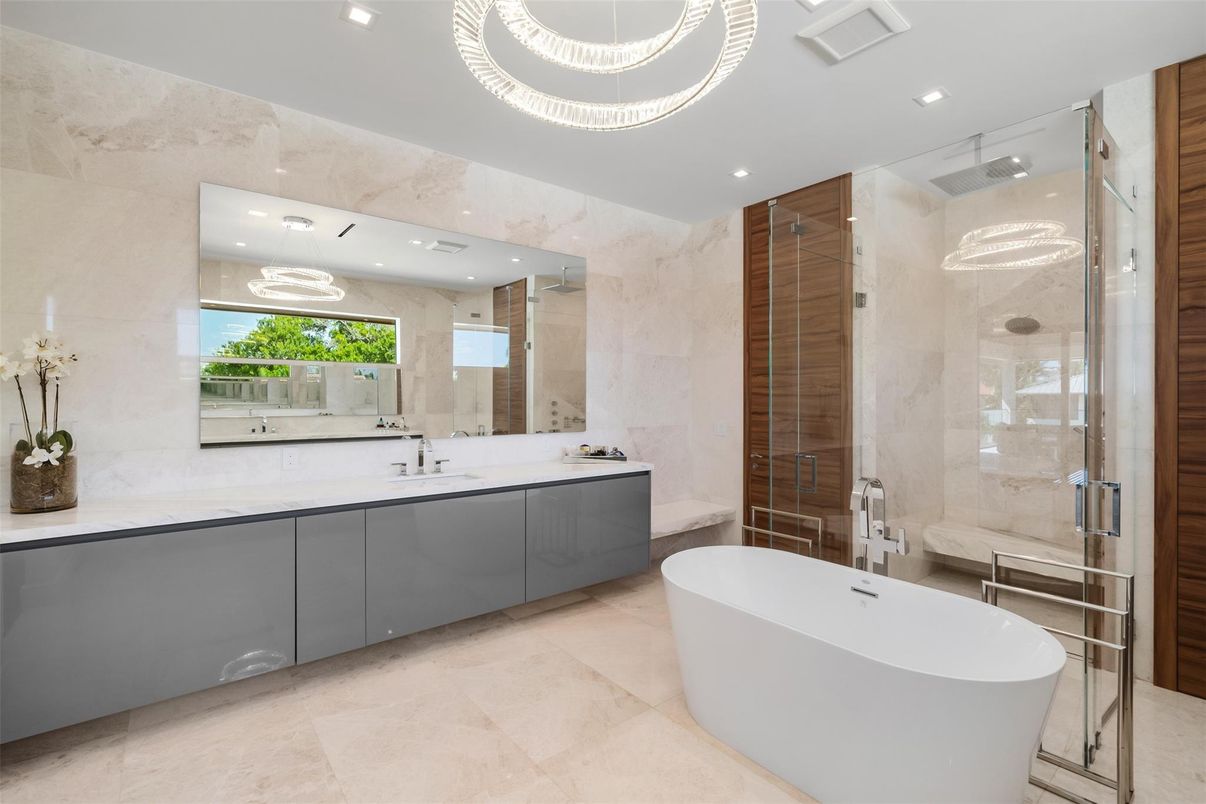 Bathroom, Dual Sink Vanities, Free Standing Baths, Glass Shower, Interior, Marble Walls, Pendant Lights, Recessed Lighting