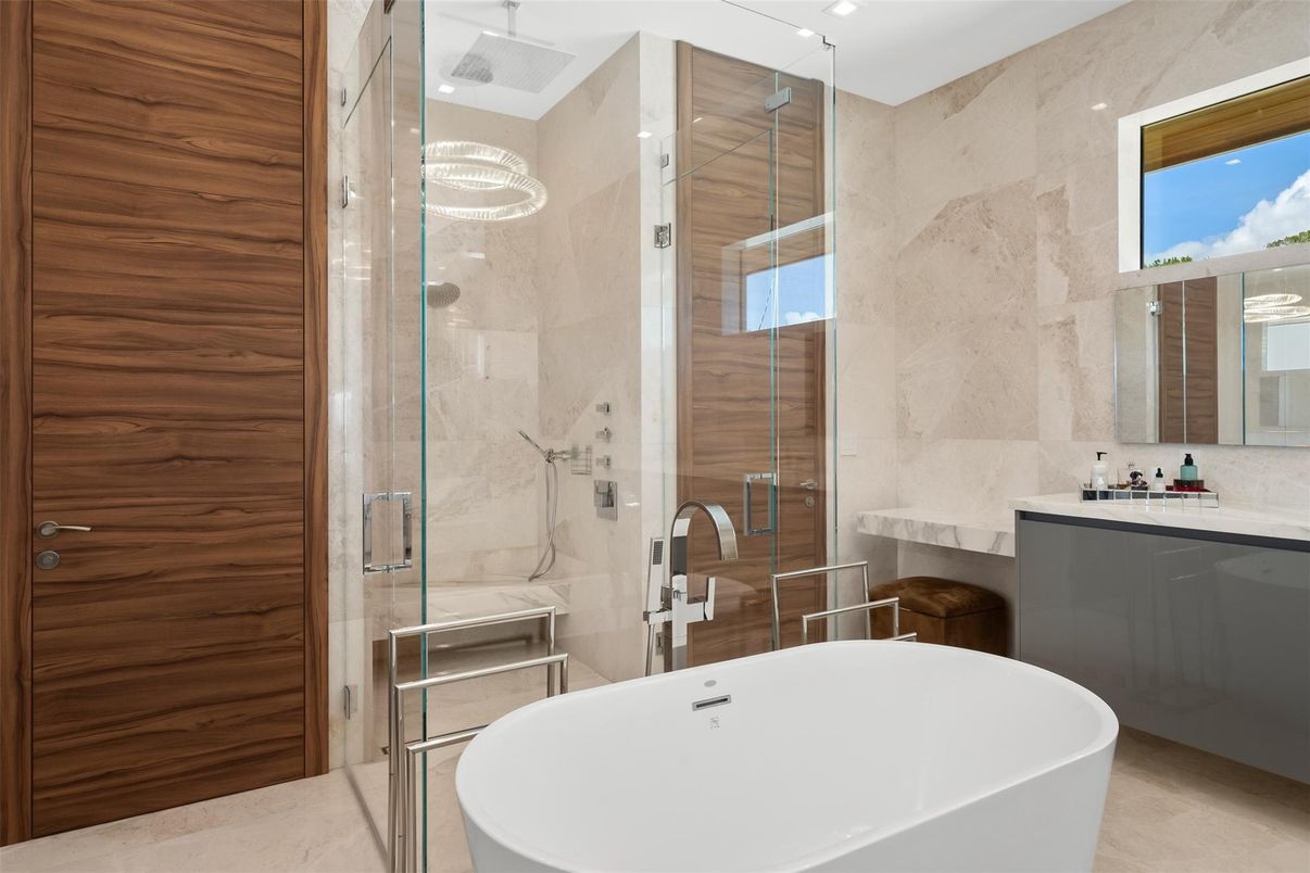 Bathroom, Free Standing Baths, Glass Shower, Interior, Marble Walls, Recessed Lighting, Wooden Walls