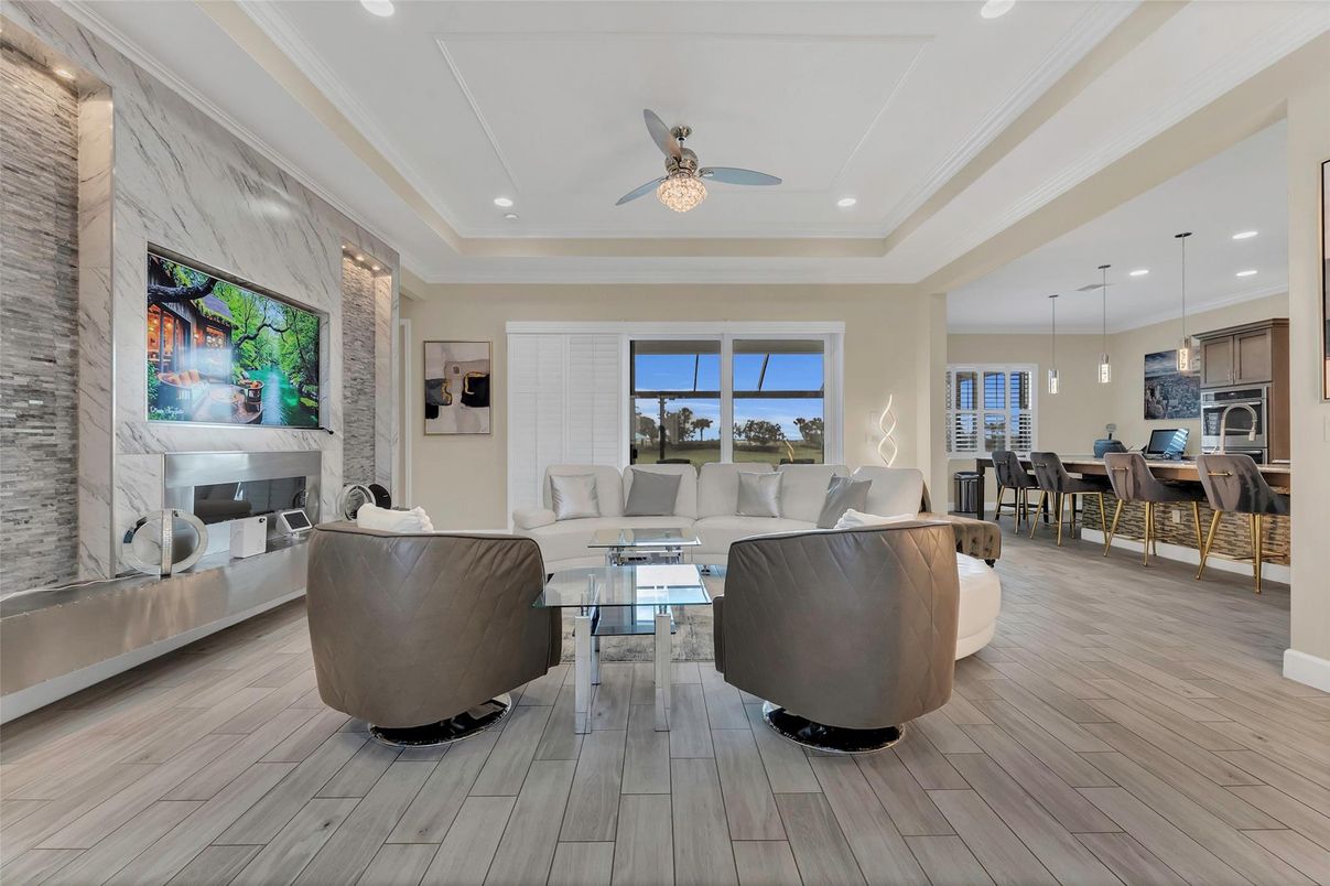 Dining room, Fireplace, Interior, Kitchen, Living room, Pendant Lights, Recessed Lighting, Stainless Steel Appliances, Stone Walls, Wood Texture Flooring