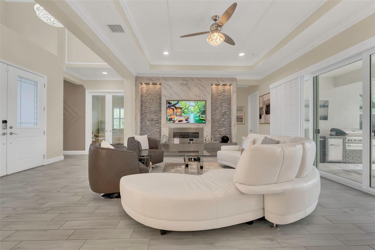 Fireplace, Interior, Living room, Recessed Lighting, Stone Walls, Wood Texture Flooring