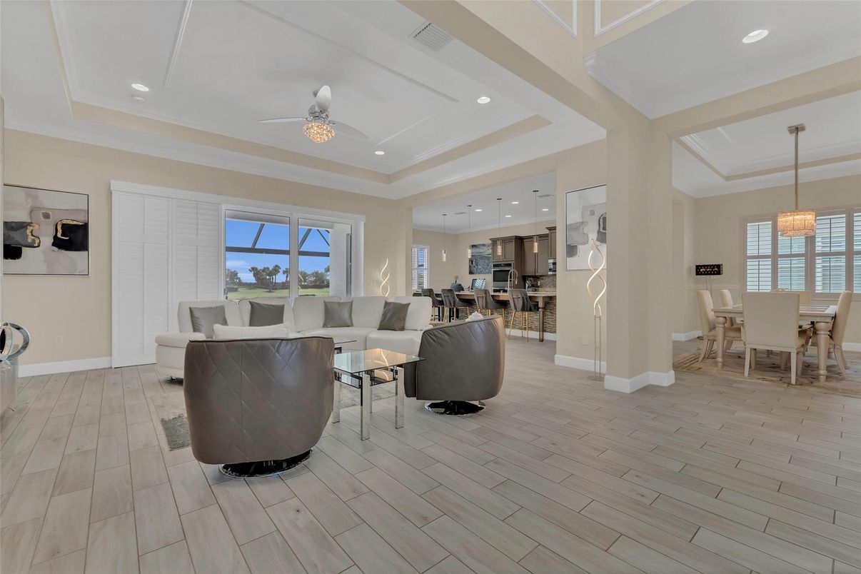 Dining room, Interior, Kitchen, Living room, Pendant Lights, Recessed Lighting, Stainless Steel Appliances, Wood Texture Flooring