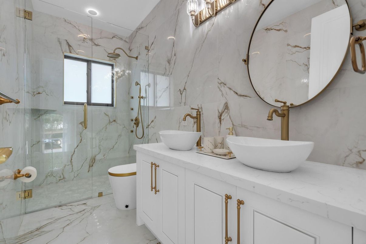 Bathroom, Dual Sink Vanities, Free Standing Baths, Glass Shower, Interior, Marble, Marble Walls, Recessed Lighting