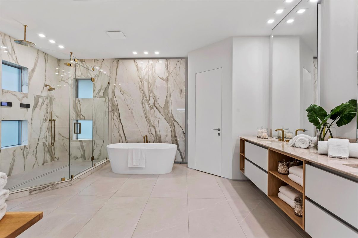 Bathroom, Dual Sink Vanities, Free Standing Baths, Glass Shower, Interior, Marble Walls, Recessed Lighting
