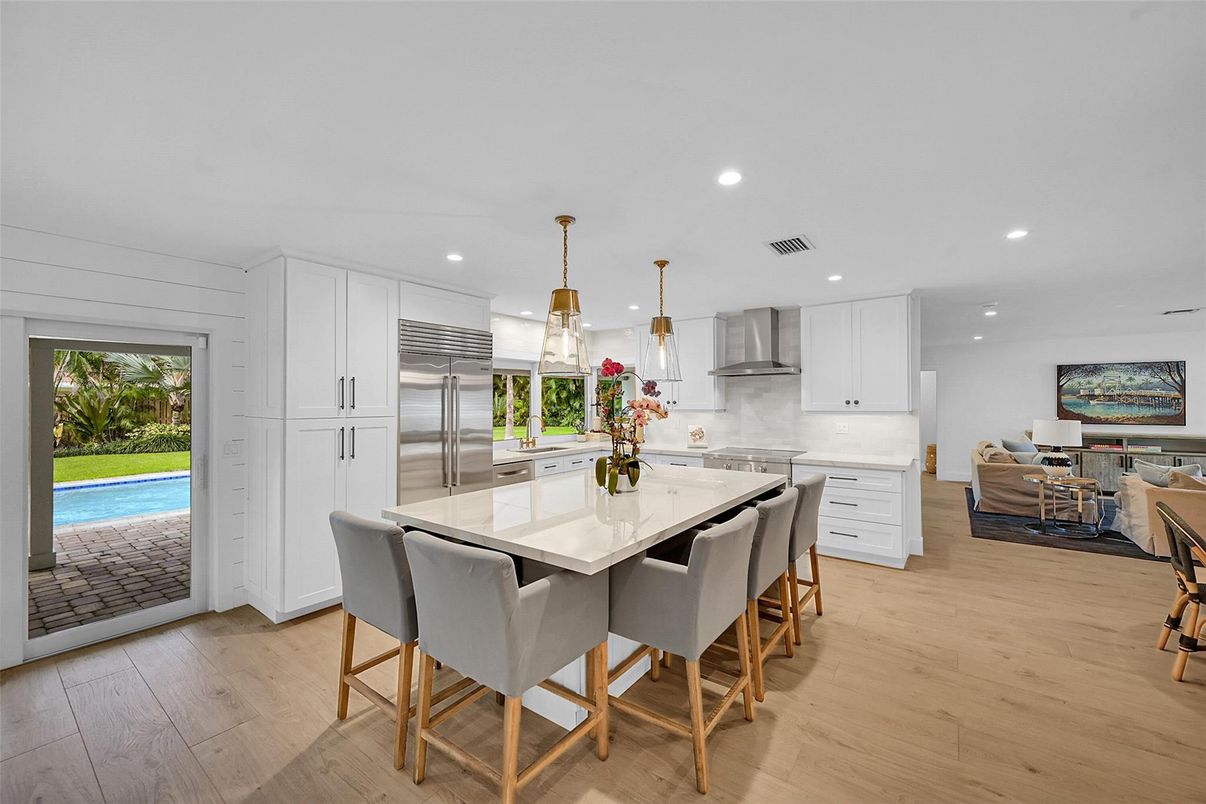 Dining room, Interior, Kitchen, Living room, Pendant Lights, Recessed Lighting, Stainless Steel Appliances, Wood Texture Flooring