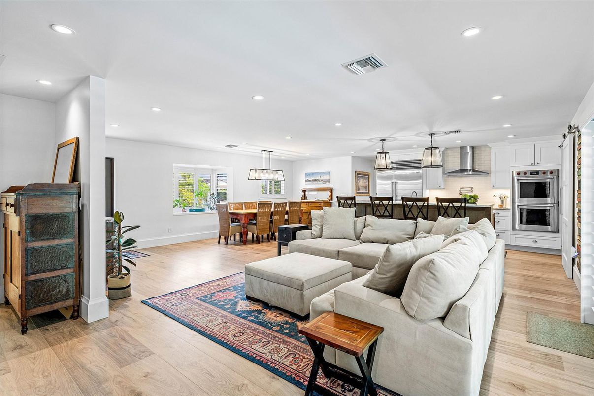 Dining room, Interior, Kitchen, Living room, Pendant Lights, Recessed Lighting, Stainless Steel Appliances, Wood Texture Flooring