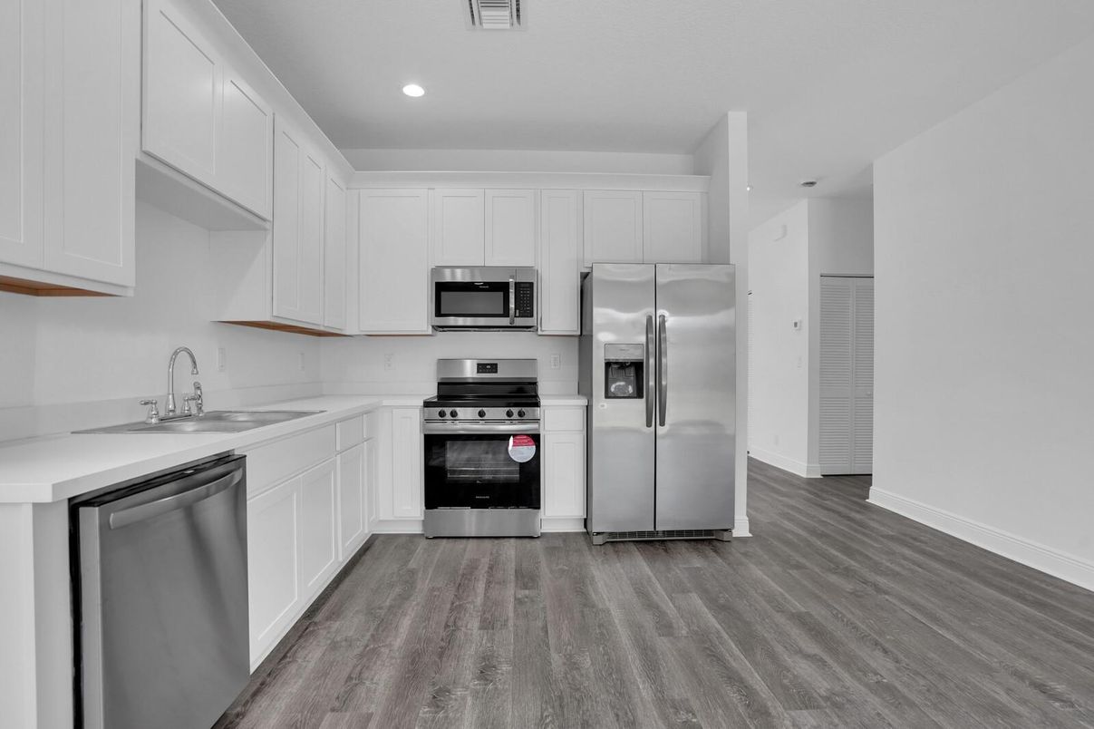 Interior, Kitchen, Recessed Lighting, Stainless Steel Appliances, Wood Texture Flooring