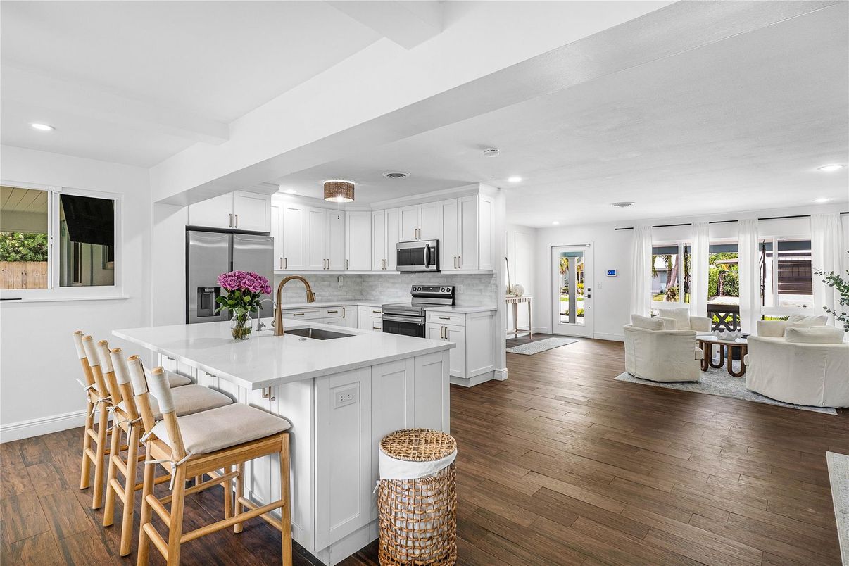 Dining room, Interior, Kitchen, Living room, Recessed Lighting, Stainless Steel Appliances, Wood Texture Flooring