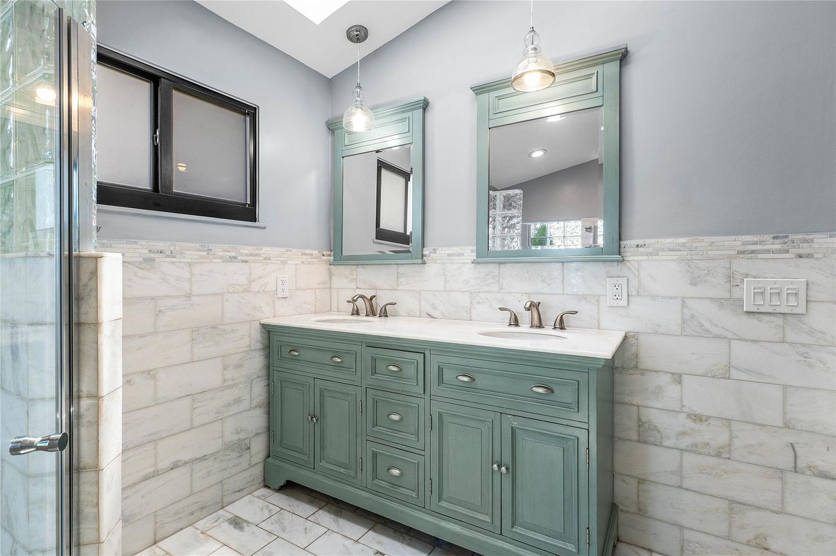 Bathroom, Dual Sink Vanities, Interior, Marble Walls, Pendant Lights, Recessed Lighting