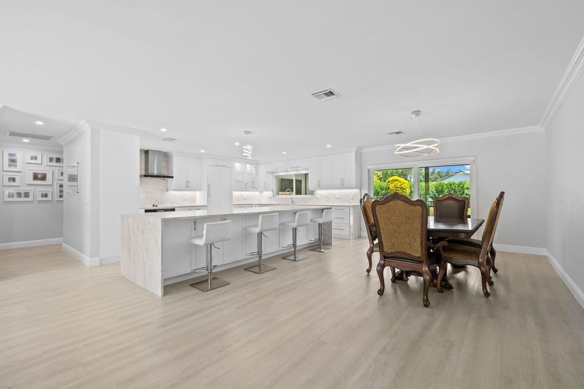 Dining room, Interior, Kitchen, Pendant Lights, Recessed Lighting, Stainless Steel Appliances, Wood Texture Flooring