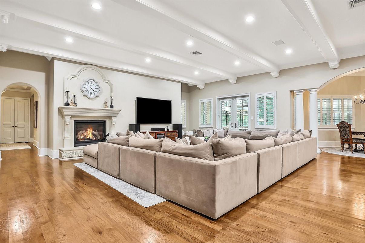 Dining room, Fireplace, Interior, Living room, Recessed Lighting, Wood Texture Flooring