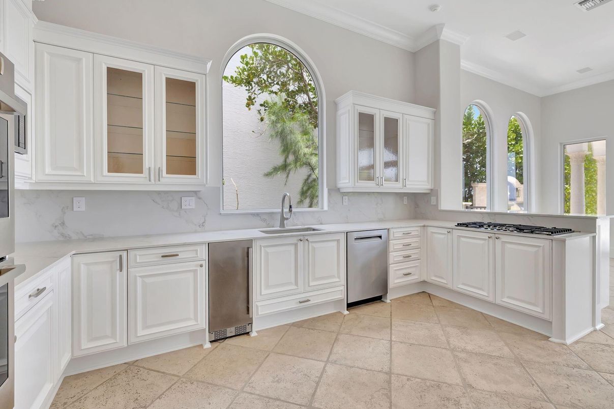 Interior, Kitchen, Marble Walls, Recessed Lighting, Stainless Steel Appliances