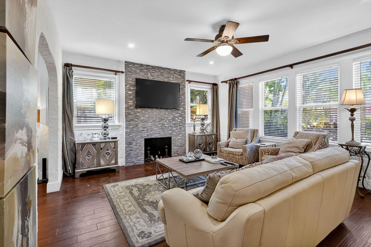 Fireplace, Interior, Living room, Recessed Lighting, Stone Walls, Wood Texture Flooring