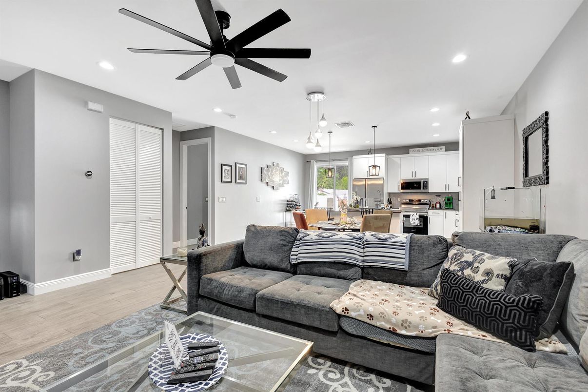 Dining room, Interior, Kitchen, Living room, Pendant Lights, Recessed Lighting, Stainless Steel Appliances, Wood Texture Flooring