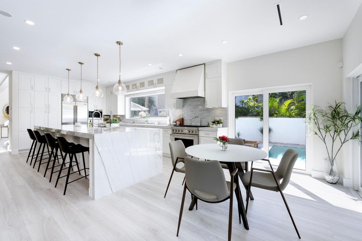 Dining room, Interior, Kitchen, Pendant Lights, Recessed Lighting, Stainless Steel Appliances, Wood Texture Flooring