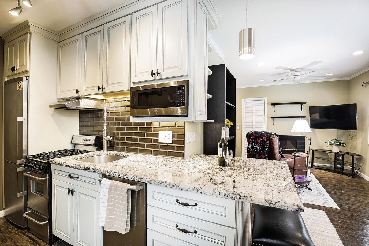 Interior, Kitchen, Pendant Lights, Recessed Lighting, Stainless Steel Appliances, Wood Texture Flooring