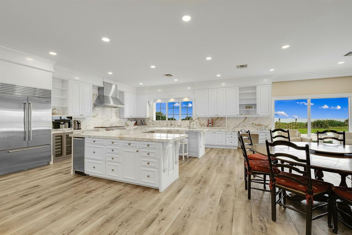 Dining room, Interior, Kitchen, Recessed Lighting, Stainless Steel Appliances, Wood Texture Flooring
