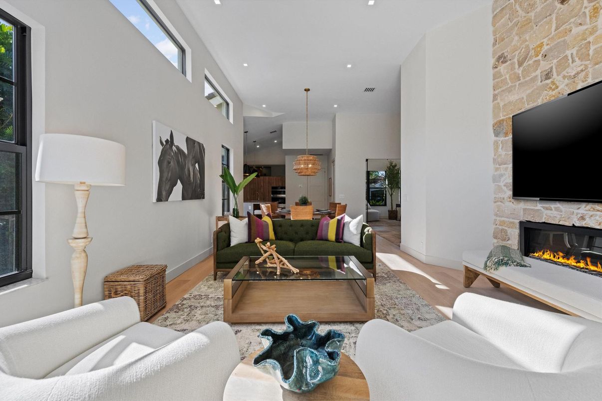 Fireplace, Interior, Living room, Pendant Lights, Recessed Lighting, Stone Walls, Wood Texture Flooring