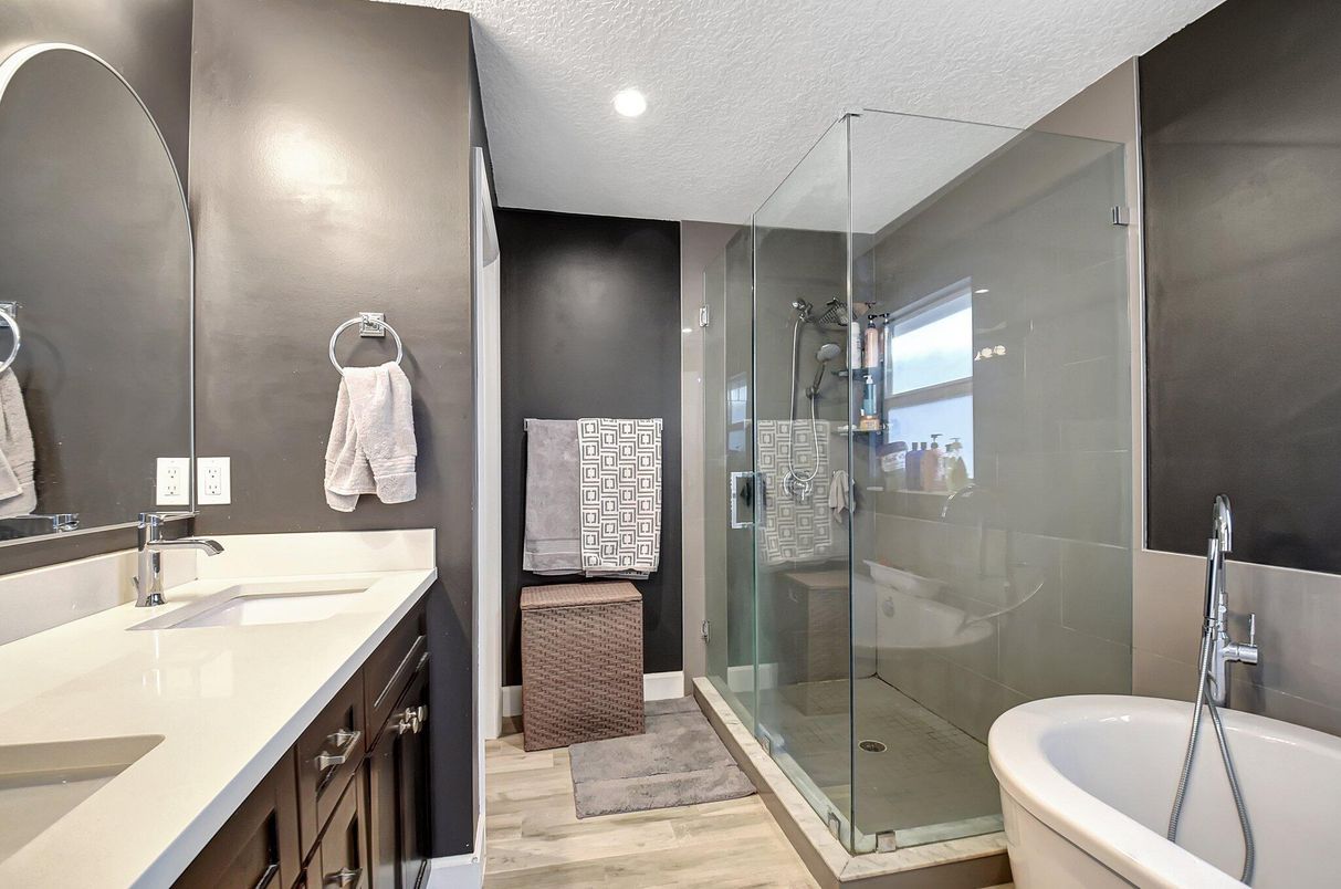 Bathroom, Dual Sink Vanities, Glass Shower, Interior, Recessed Lighting, Wood Texture Flooring