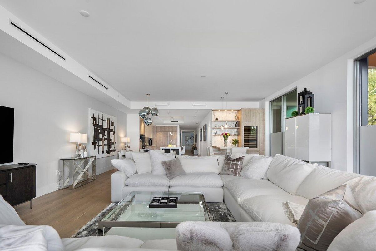 Chandelier, Dining room, Interior, Kitchen, Living room, Pendant Lights, Recessed Lighting, Stainless Steel Appliances, Wood Texture Flooring