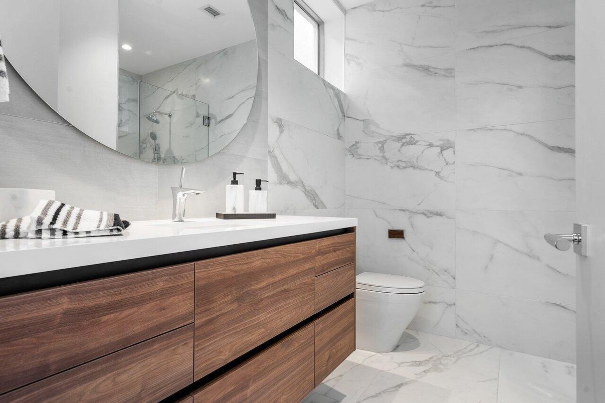 Bathroom, Dual Sink Vanities, Interior, Marble, Marble Walls, Recessed Lighting