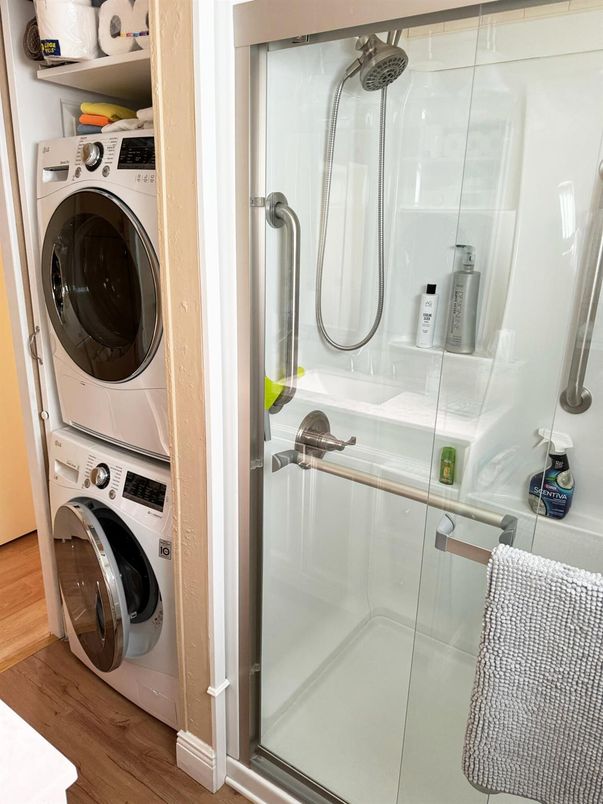Bathroom, Glass Shower, Interior, Utility Closets, Washer, Wood Texture Flooring