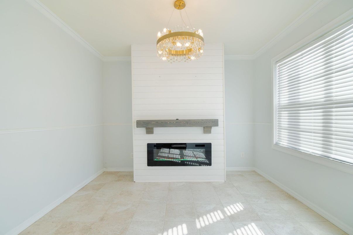 Chandelier, Empty room, Fireplace, Interior