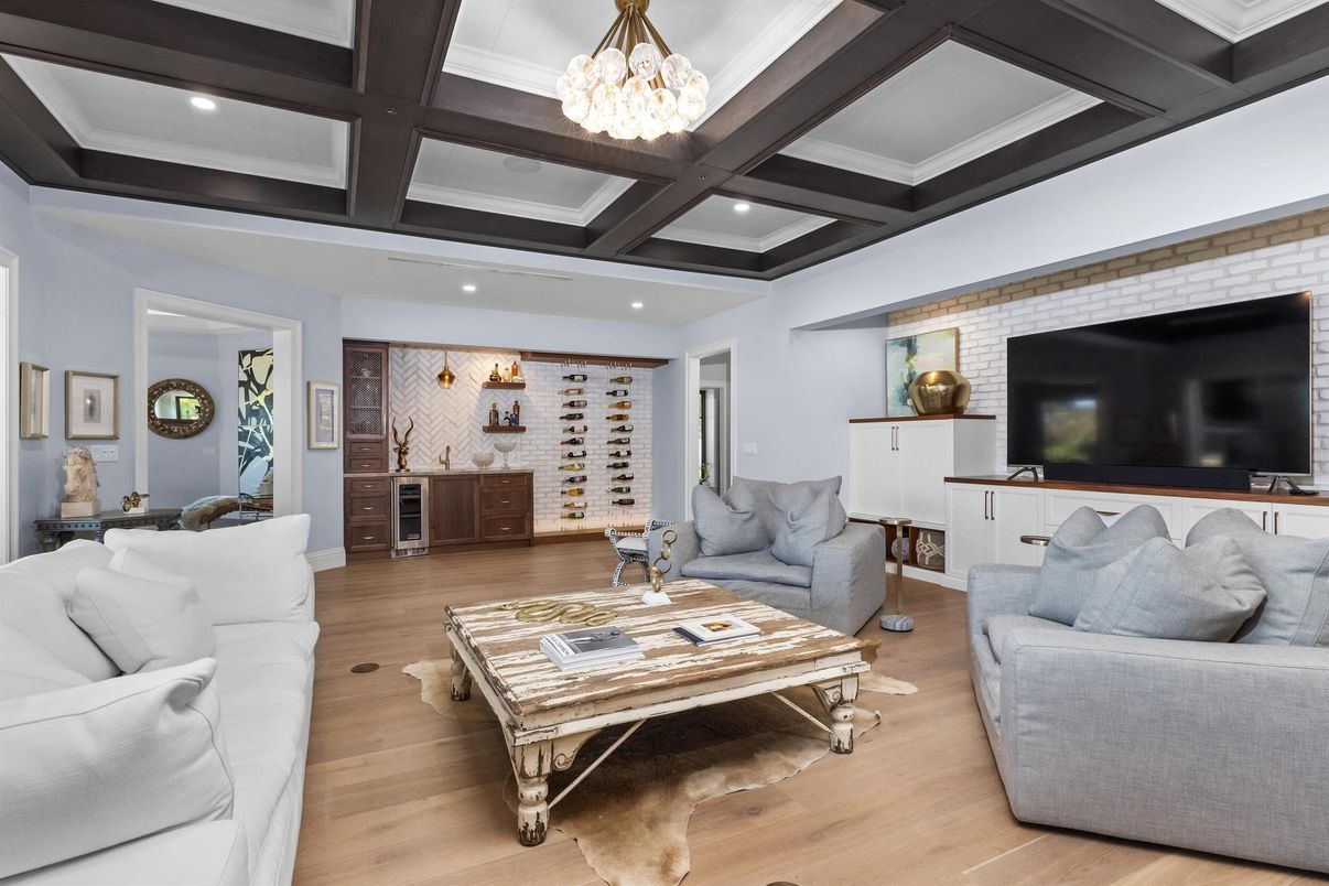 Chandelier, Interior, Living room, Recessed Lighting, Stone Walls, Wood Texture Flooring