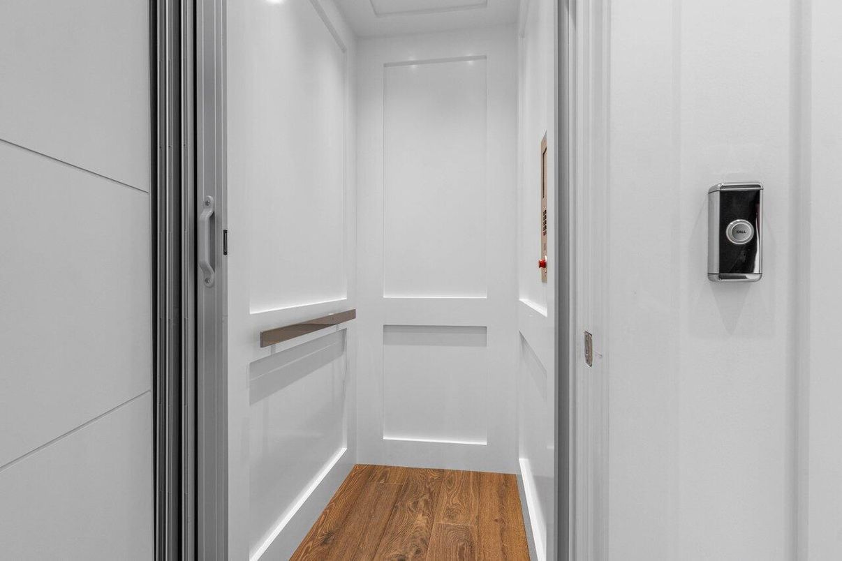 Elevator, Interior, Recessed Lighting, Wood Texture Flooring