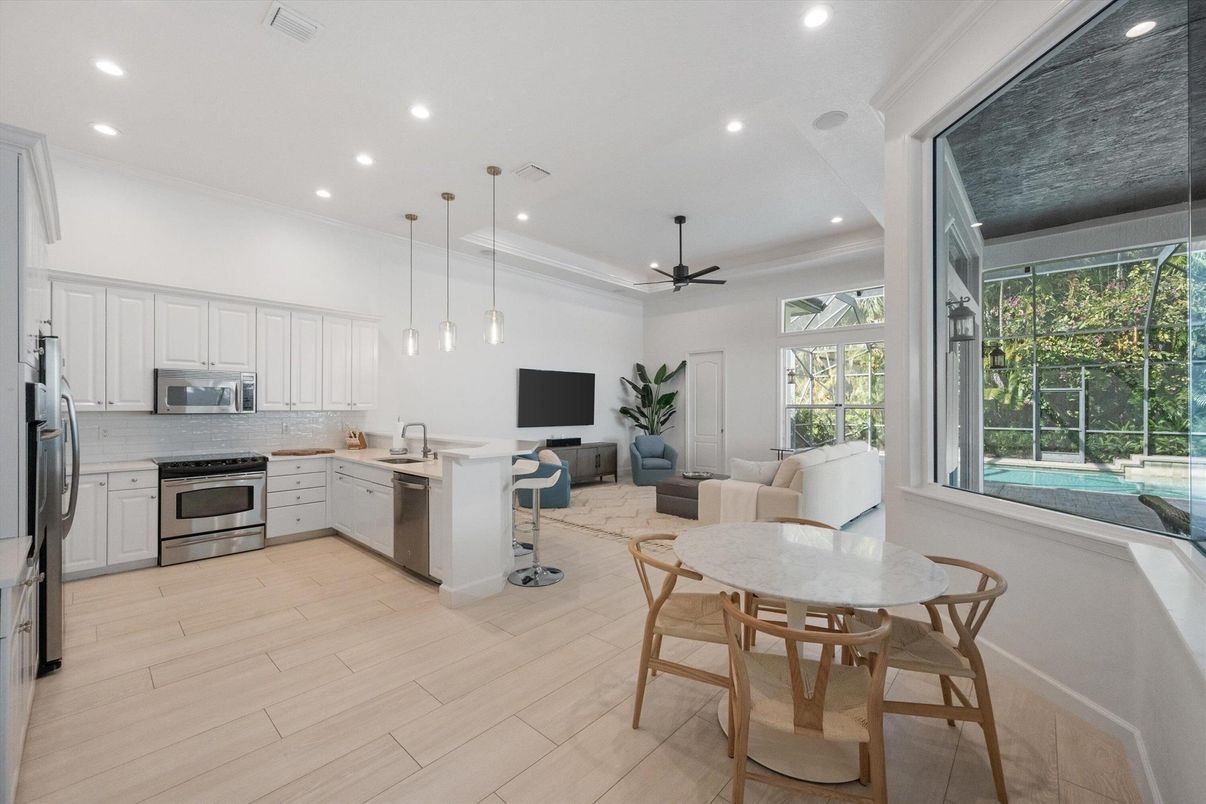 Dining room, Interior, Kitchen, Living room, Pendant Lights, Recessed Lighting, Stainless Steel Appliances, Wood Texture Flooring