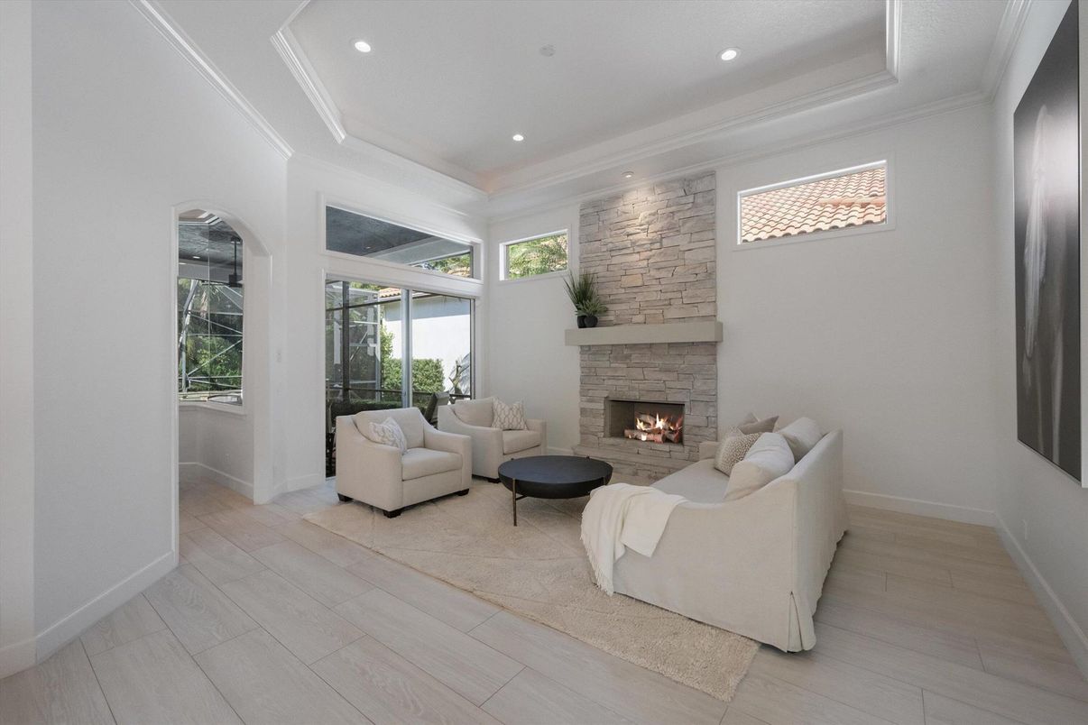 Fireplace, Interior, Living room, Recessed Lighting, Stone Walls, Wood Texture Flooring