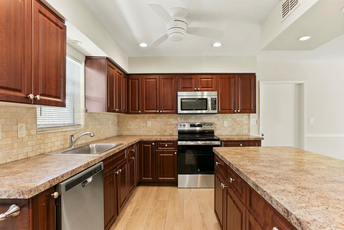 Interior, Kitchen, Recessed Lighting, Stainless Steel Appliances, Wood Texture Flooring
