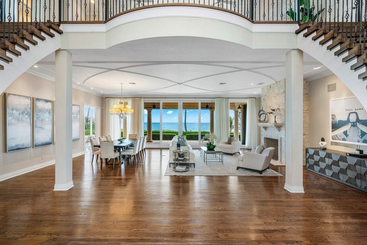 Chandelier, Dining room, Fireplace, Interior, Living room, Recessed Lighting, Water, Wood Texture Flooring