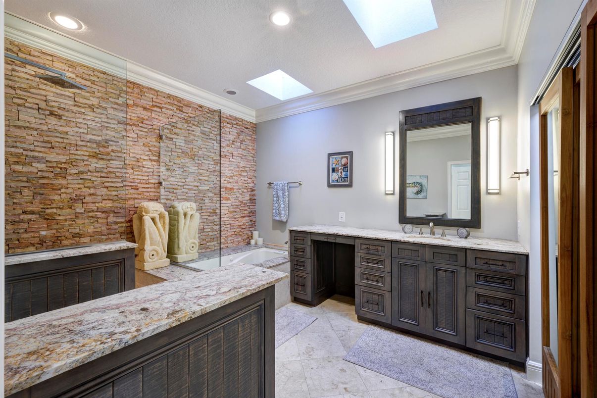 Bathroom, Dual Sink Vanities, Glass Shower, Interior, Recessed Lighting, Stone Walls