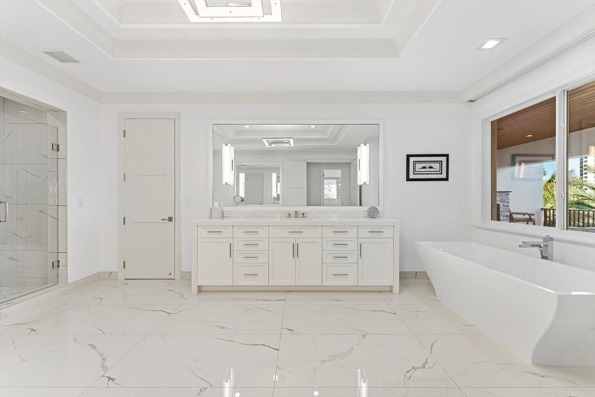 Bathroom, Dual Sink Vanities, Free Standing Baths, Glass Shower, Interior, Marble, Marble Walls, Recessed Lighting