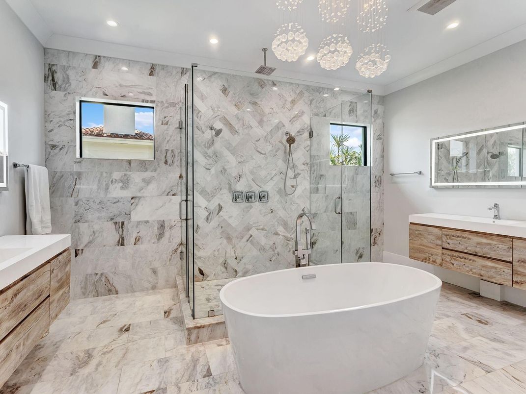 Bathroom, Free Standing Baths, Glass Shower, Interior, Marble, Marble Walls, Pendant Lights, Recessed Lighting