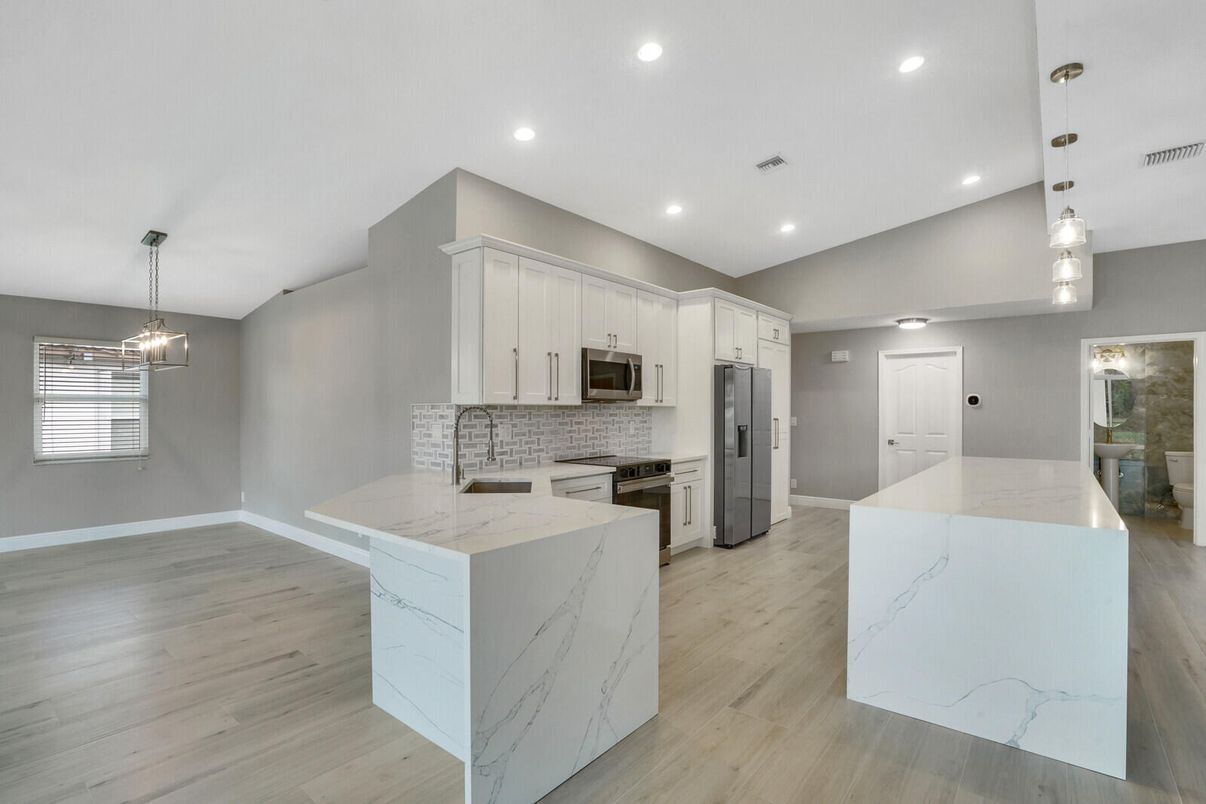 Interior, Kitchen, Pendant Lights, Recessed Lighting, Stainless Steel Appliances, Wood Texture Flooring