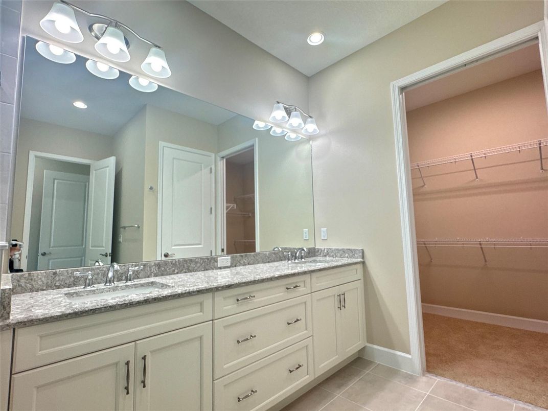 Bathroom, Dual Sink Vanities, Interior, Recessed Lighting, Walk-in Closets