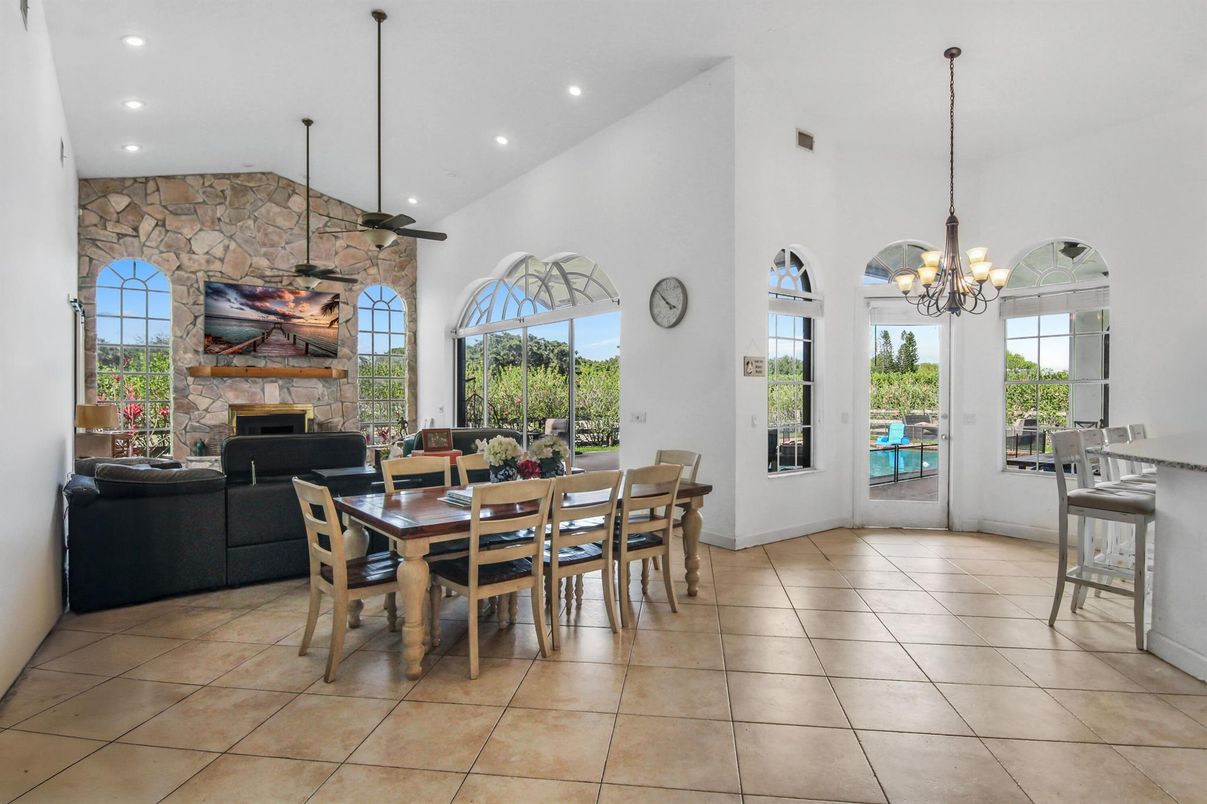 Chandelier, Dining room, Fireplace, Interior, Living room, Recessed Lighting, Stone Walls