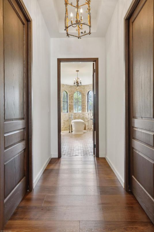 Bathroom, Chandelier, Free Standing Baths, Interior, Wood Texture Flooring