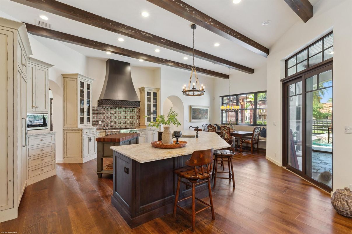 Chandelier, Dining room, Interior, Kitchen, Pendant Lights, Recessed Lighting, Stainless Steel Appliances, Wooden Beams, Wood Texture Flooring