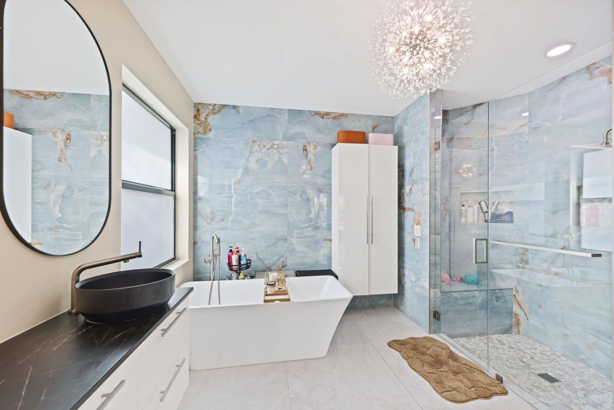 Bathroom, Chandelier, Free Standing Baths, Glass Shower, Interior, Marble, Marble Walls, Recessed Lighting