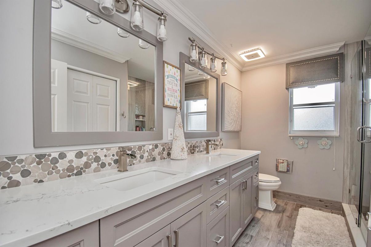 Bathroom, Dual Sink Vanities, Glass Shower, Interior, Wood Texture Flooring