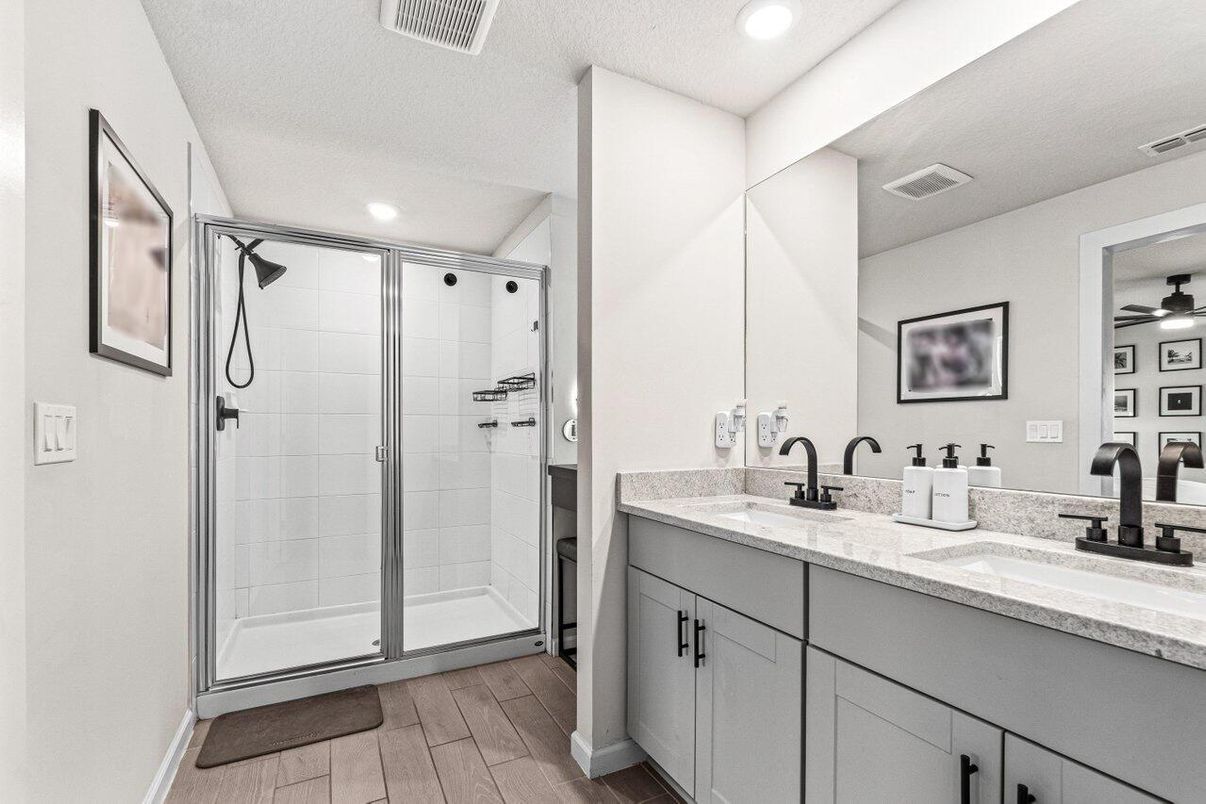 Bathroom, Dual Sink Vanities, Glass Shower, Interior, Recessed Lighting, Wood Texture Flooring