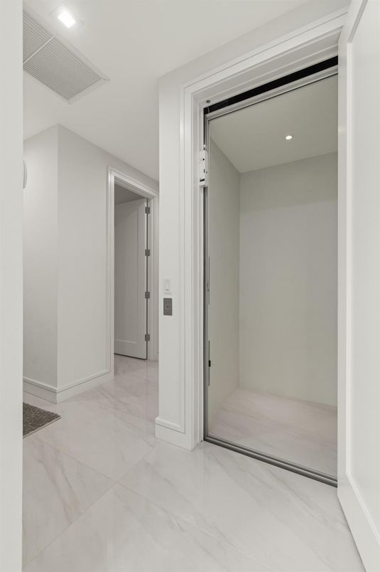 Elevator, Interior, Marble, Recessed Lighting